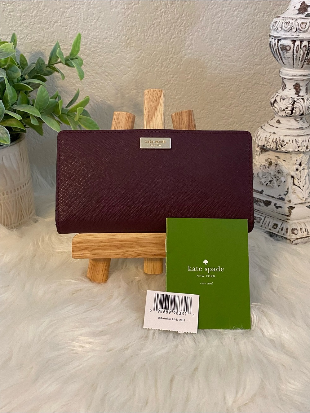 kate spade plum/burgundy Saffiano snap bifold wallet with gold logo
